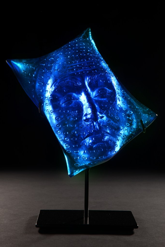 Binary Hybrid Blue, a blue cast-glass sculpture by artist Julie Rotblatt-Amrany