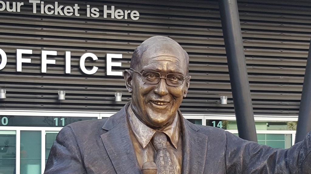 Bronze sculpture of announcer Bob Miller by artist Julie Rotblatt-Amrany for LA Kings