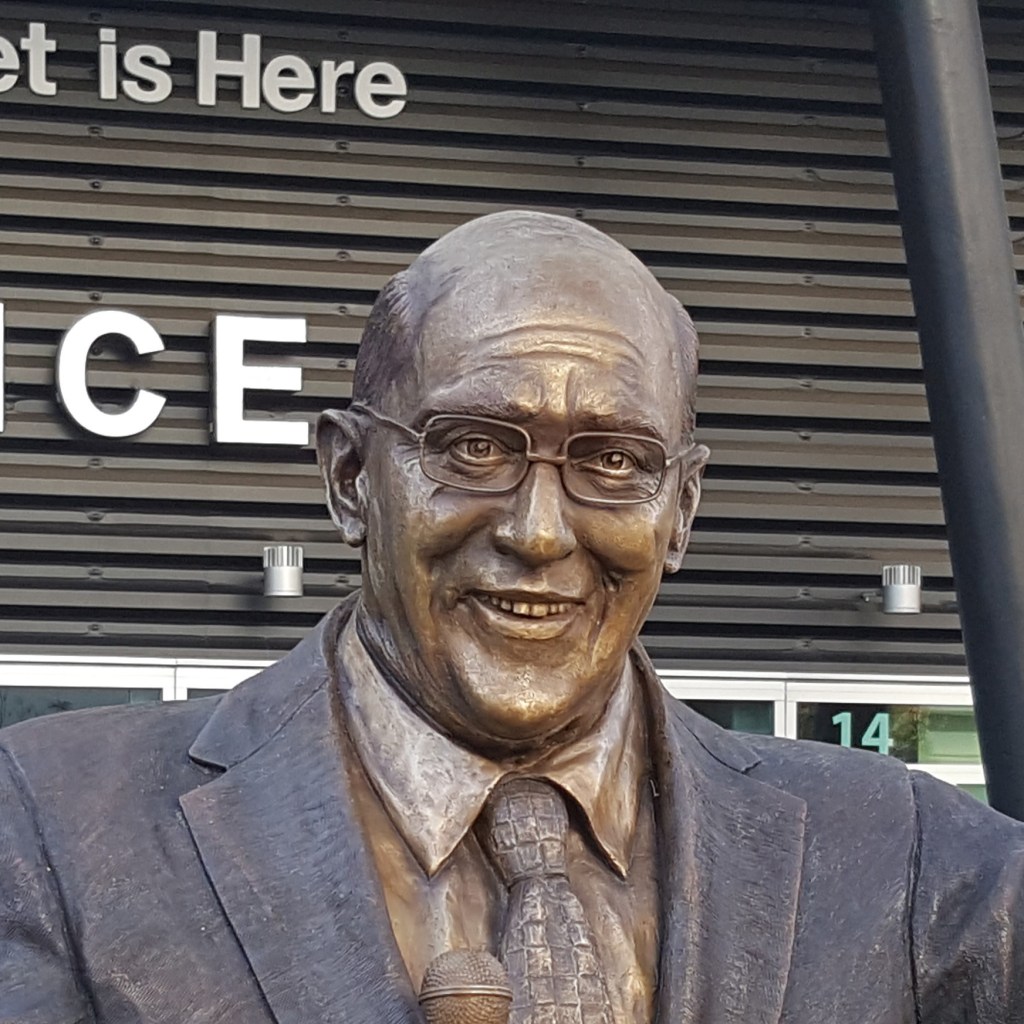 Bronze sculpture of announcer Bob Miller by artist Julie Rotblatt-Amrany for LA Kings