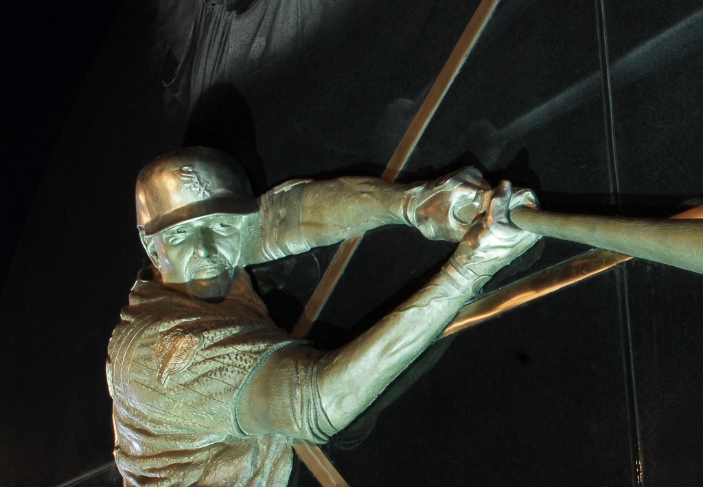 Bronze relief sculpture of Paul Konerko for 2005 White Sox Championship Moments Monument by artist Julie Rotblatt-Amrany