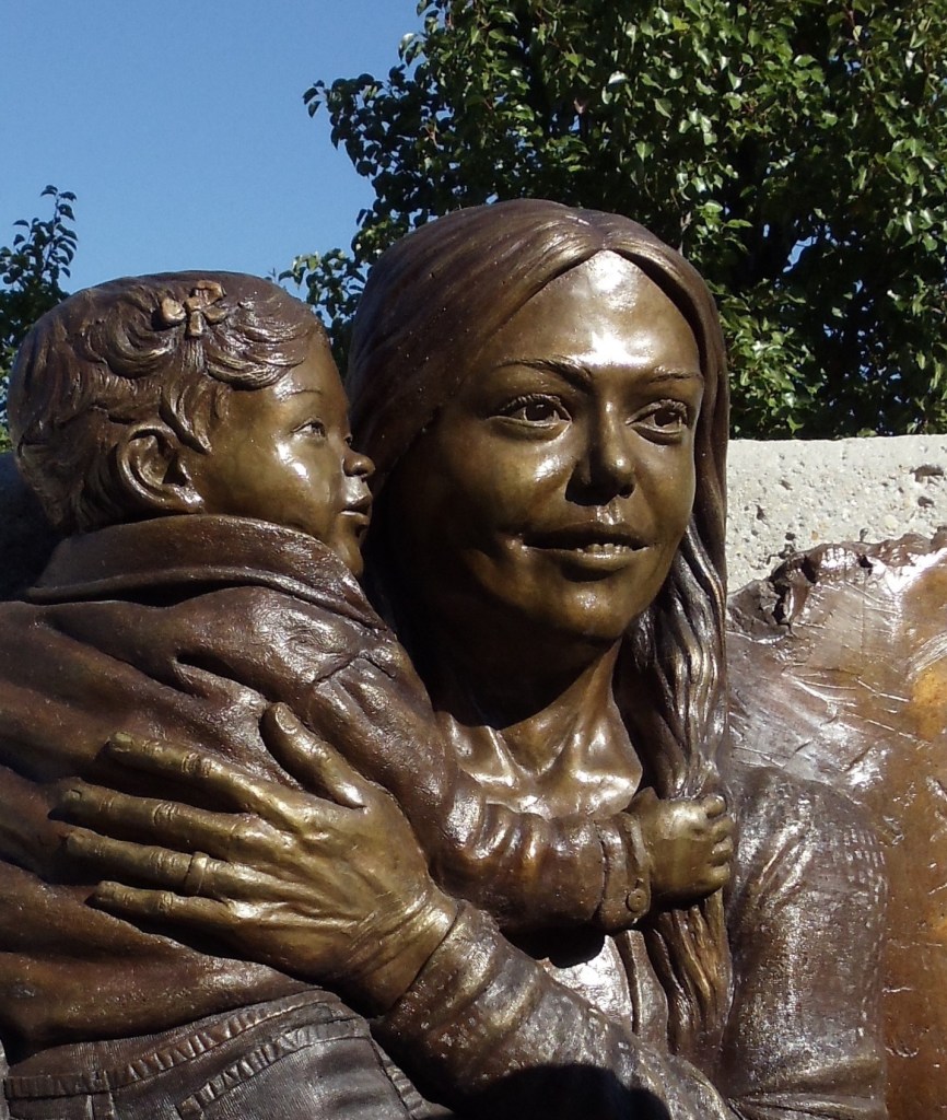 Close up of bronze sculpture Tribute to Injured Police Officers and Their Families in Grant Park, Chicago by artist Julie Rotblatt-Amrany