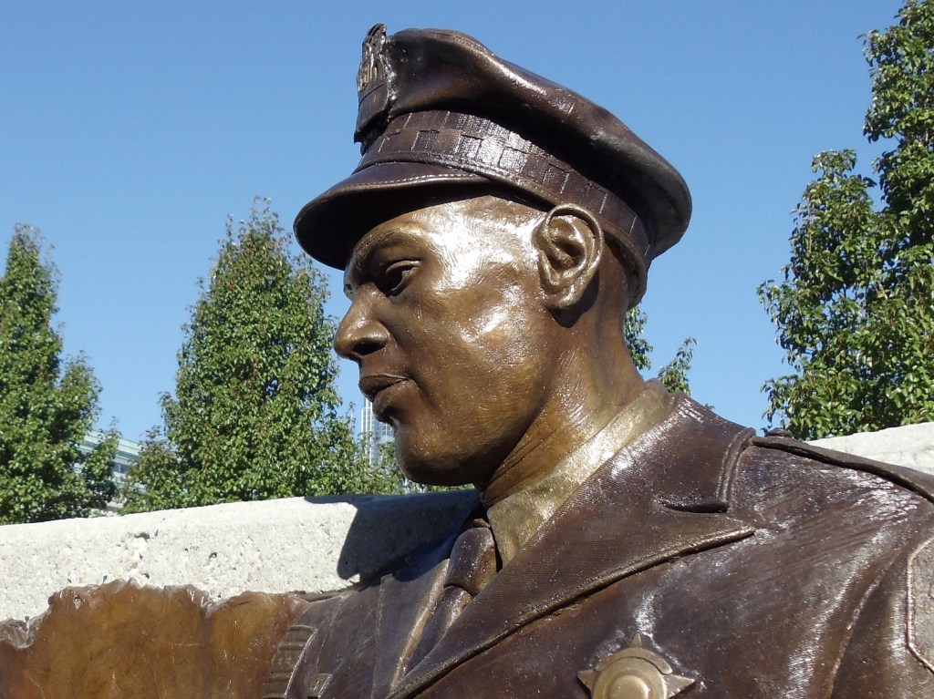 Close up of bronze sculpture for Grant Park Tribute to Injured Police Officers and Their Families, by Julie Rotblatt-Amrany