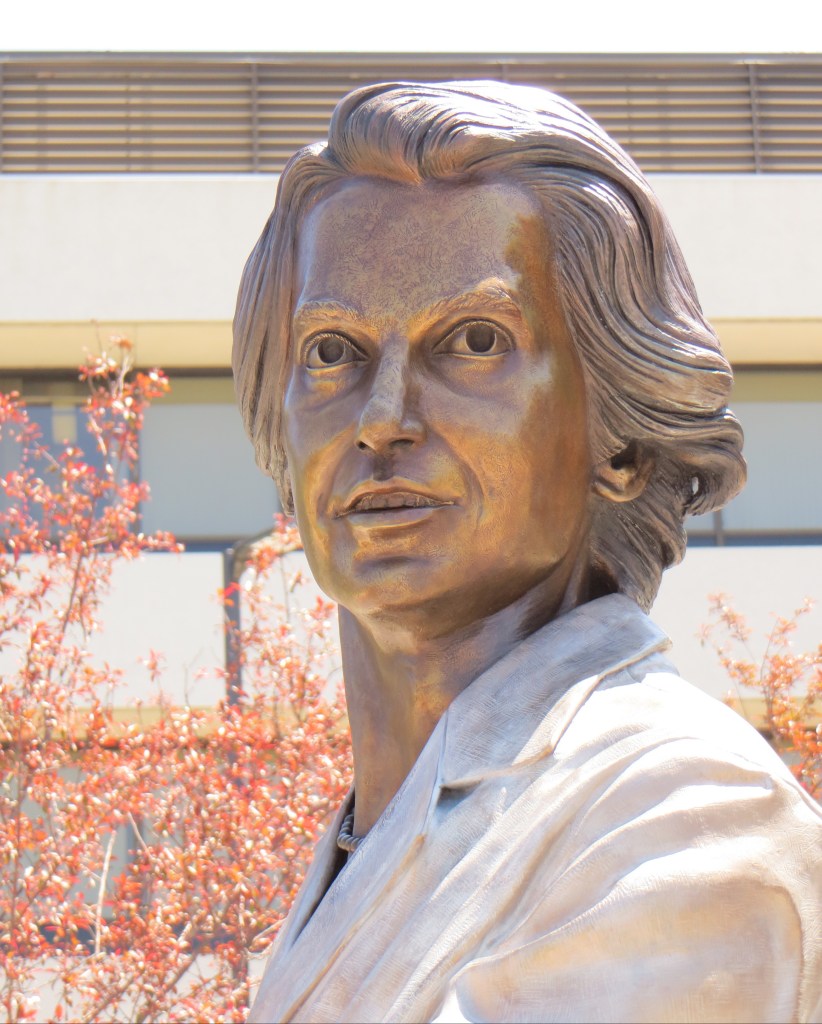 Bronze portrait sculpture of Rosalind Franklin by artist Julie Rotblatt-Amrany for Rosalind Franklin University of Medicine and Science