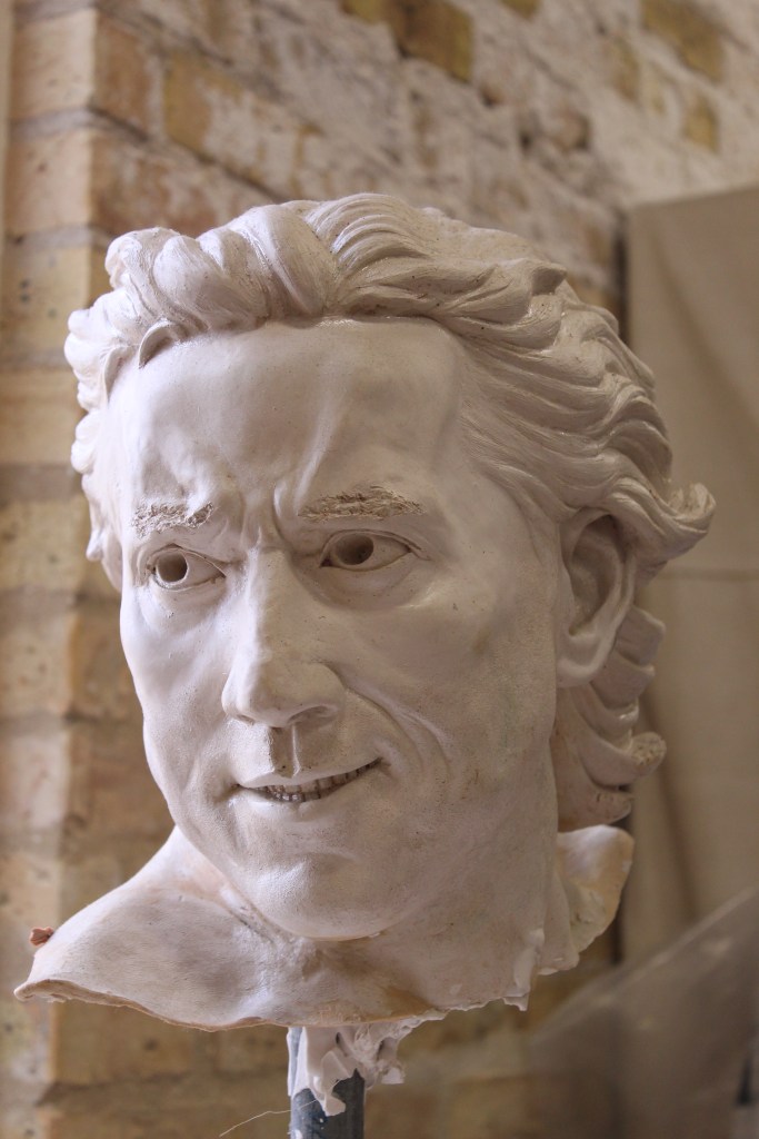 Plaster bust of Jackie Chan by artist Julie Rotblatt-Amrany