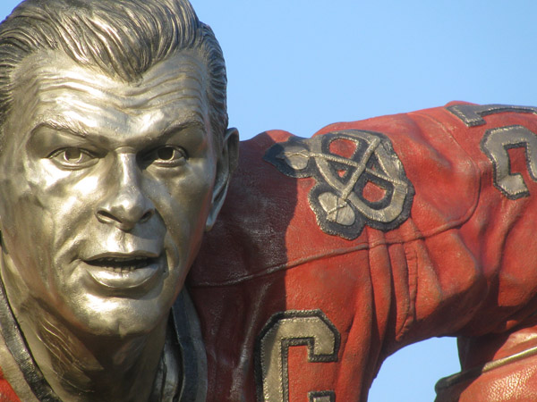 Close up portrait sculpture of Stan Mikita in bronze by artist Julie Rotblatt-Amrany for the Chicago Blackhawks