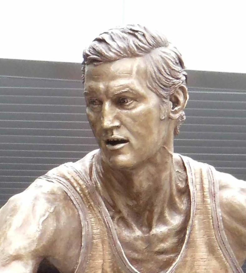 Bronze sculpture of basketball player Jerry West by artist Julie Rotblatt-Amrany for