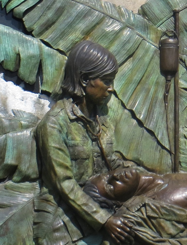 Bronze sculpture of Vietnam War nurse in Community Veterans Memorial Park by artist Julie Rotblatt-Amrany