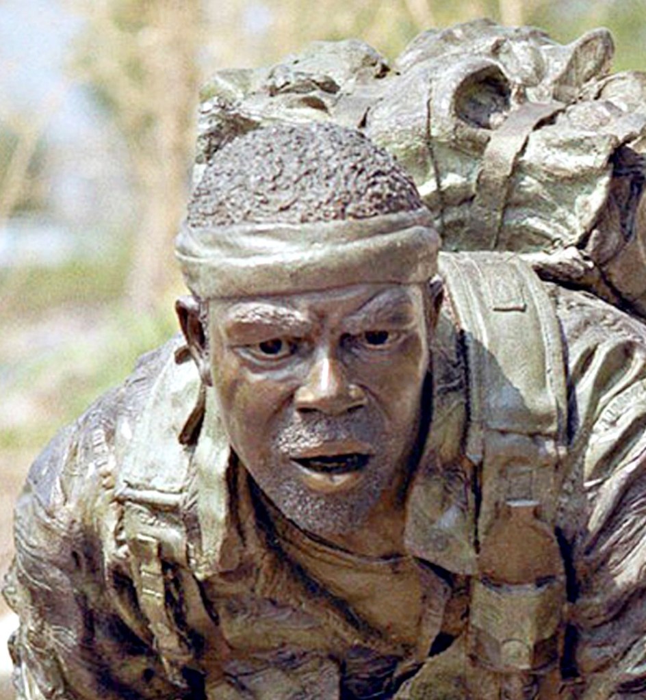 Sculpture in bronze of Vietnam soldier at Community Veterans Memorial Park in Munster, IN by artist Julie Rotblatt-Amrany