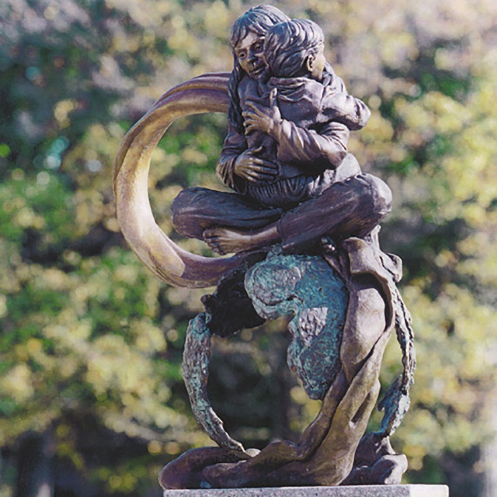 Compassion Moves a World, a bronze memorial sculpture by artist Julie Rotblatt-Amrany in Highland Park, IL