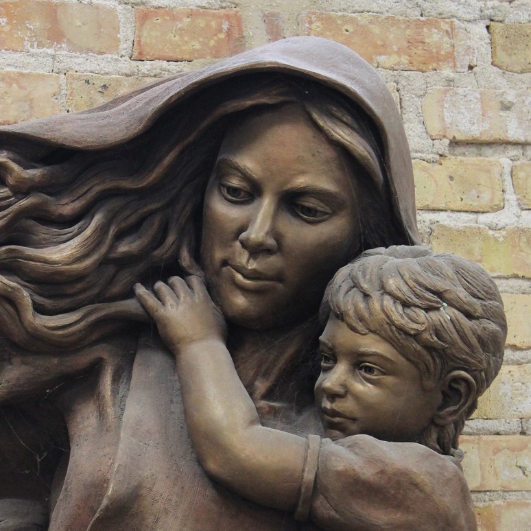 Madonna and Child, a bronze sculpture for Mt. Carmel High School by artist Julie Rotblatt-Amrany
