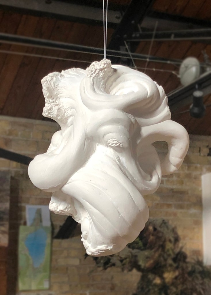 Planetary Mischeif, a sculpture in plaster by Julie Rotblatt-Amrany